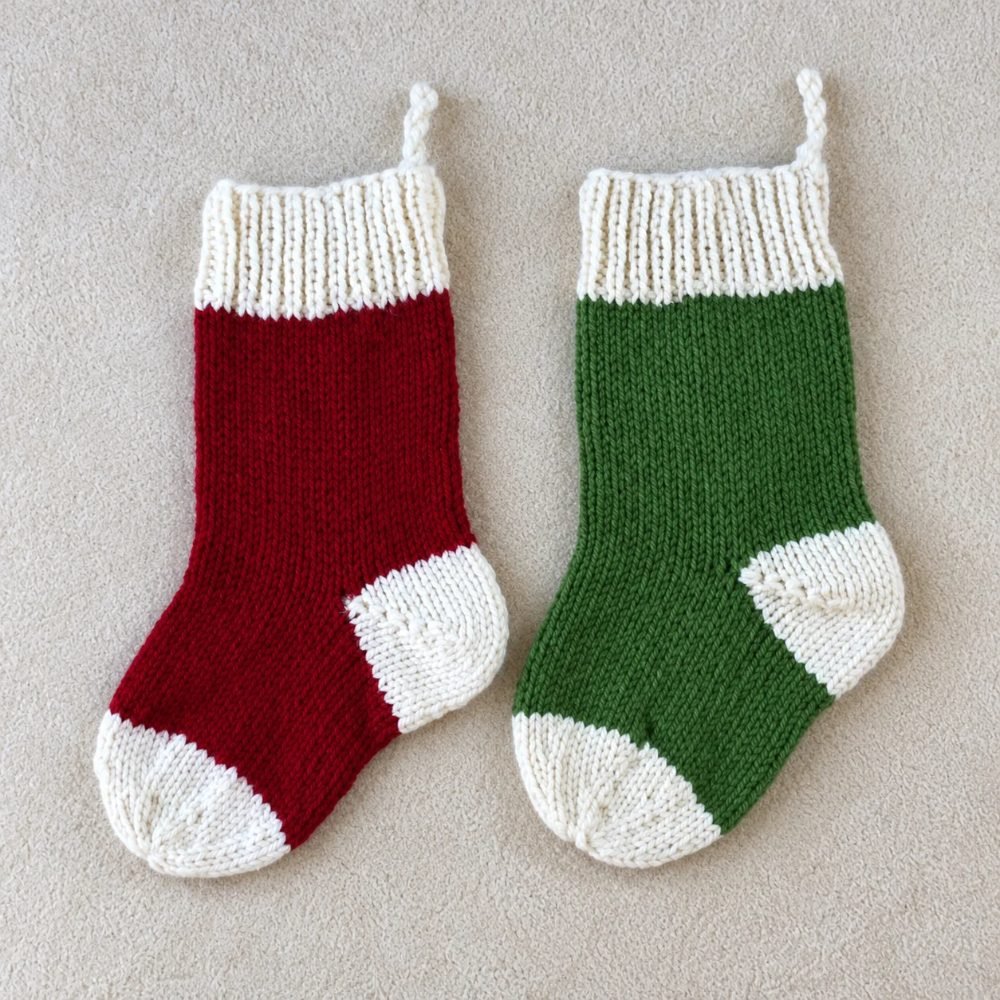 Red and green knitted Christmas stockings with white cuffs, heels and toes, from Originally Lovely